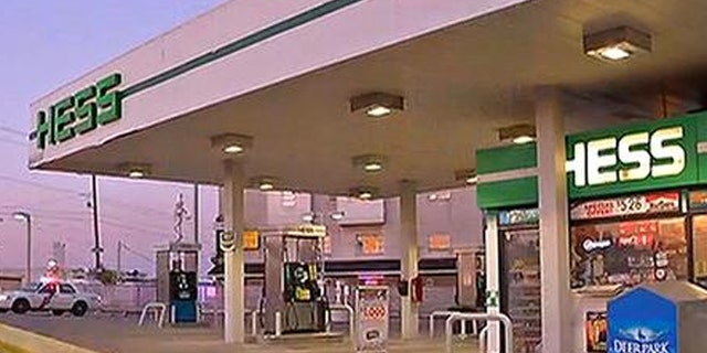 Police are searching for men who tied up a gas station clerk and then posed as employees, working the pumps and taking cash from unsuspecting customers.