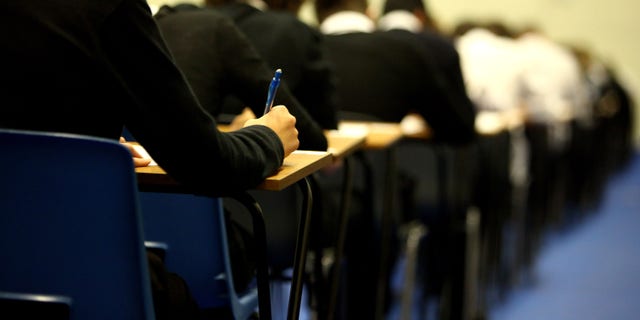 GLASGOW, UNITED KINGDOM - FEBRUARY 05: Pupils at Williamwood High School sit prelim exams on February 5, 2010 in Glasgow, Scotland As the UK gears up for one of the most hotly contested general elections in recent history it is expected that that the economy, immigration, the NHS and education are likely to form the basis of many of the debates. (Photo by Jeff J Mitchell/Getty Images)