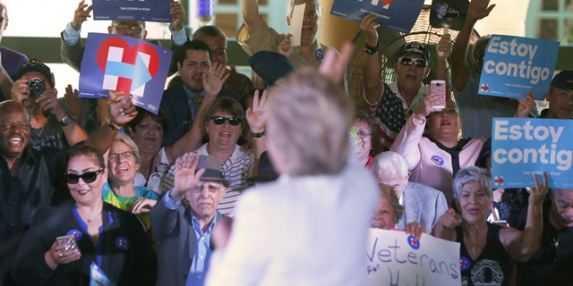SAN ANTONIO, TX - OCTOBER 15: Democratic U.S. presidential hopeful Hillary Clinton acknowledges supporters at a "Latinos for Hillary" grassroots event October 15, 2015 in San Antonio, Texas. The event was part of the campaign's ongoing effort to build an organization outside of the four early states and work hard for every vote. (Photo by Erich Schlegel/Getty Images)
