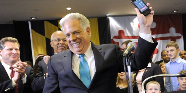 Nov. 5, 2014: Maryland Gov.-elect Larry Hogan, a Republican, gets a call from New Jersey GOP Gov. Chris Christie, Annapolis, Md.