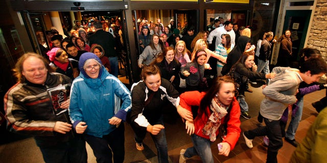 Nov. 23, 2012: Black Friday shoppers pour into the Valley River Center mall for the Midnight Madness sale, in Eugene, Ore.