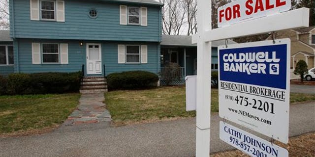 In this April 12, 2011 photo, an existing home is posted for sale in North Andover, Mass. Sales of existing-home sales rose in March, continuing an uneven recovery that began after sales bottomed last July, according to the National Association of Realtors. (AP Photo/Charles Krupa)