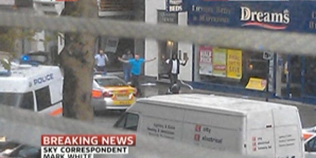 April 27, 2012: This screen grab of a SkyNews broadcast shows people being evacuated from a building in central London.