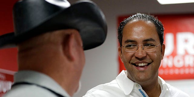 First-term Republican Rep. Will Hurd with a supporter at a campaign office, in San Antonio.