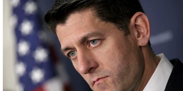 In this April 13, 2016, file photo House Speaker Paul Ryan of Wis., pauses during a news conference on Capitol Hill in Washington. Debt-ridden Puerto Rico faces a $422 million bond payment deadline May 1 with no sign Congress will act in time to help. Further complicating lawmakers efforts to steer the U.S. territory away from economic collapse are ads airing nationwide that claim the legislation amounts to a financial bailout even though the bill has no direct financial aid. House conservatives have latched onto that argument, making it difficult for Ryan, to garner support for the bill. (AP Photo/J. Scott Applewhite, File)