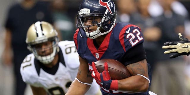 Aug 30, 2015; New Orleans, LA, USA; Houston Texans running back Chris Polk (22) makes a run in the second quarter of their game against the New Orleans Saints at the Mercedes-Benz Superdome. Mandatory Credit: Chuck Cook-USA TODAY Sports