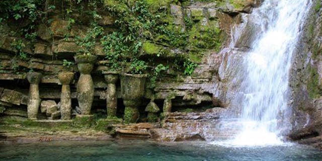 Listen to the sounds of a waterfall like this one in a jungle in northeast Mexico.