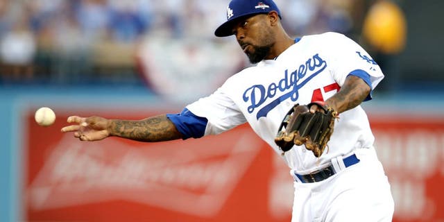 LOS ANGELES, CA - OCTOBER 15: Howie Kendrick #47 of the Los Angeles Dodgers throws to first base during Game 5 of the NLDS against the New York Mets at Dodgers Stadium on Thursday, October 15, 2015 in Los Angeles, California. (Photo by Rob Leiter/MLB Photos via Getty Images)