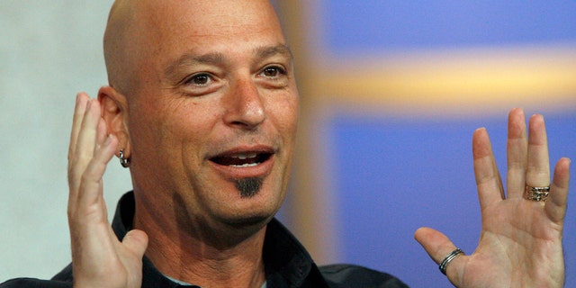 Host Howie Mandel gestures at the panel for the NBC television show
"Deal Or No Deal" at the Television Critics Association summer 2006 media tour. (REUTERS/Mario Anzuoni)
