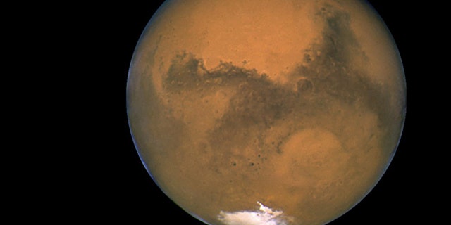 NASA's Hubble Space Telescope took this close-up of the red planet Mars when it was just 34,648,840 miles away, in 2003.