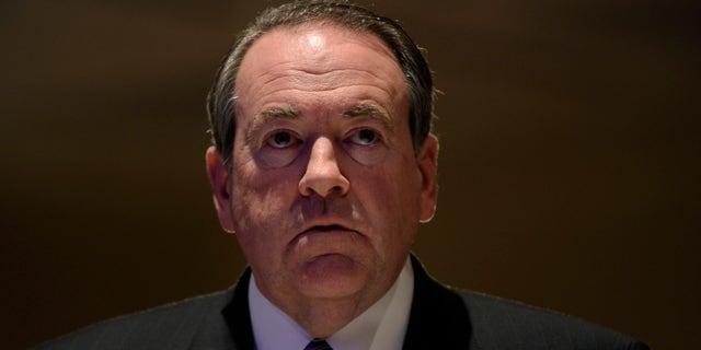 Jan. 23, 2014: Former Arkansas Gov. Mike Huckabee sits down for lunch before speaking at the Republican National Committee winter meeting in Washington.