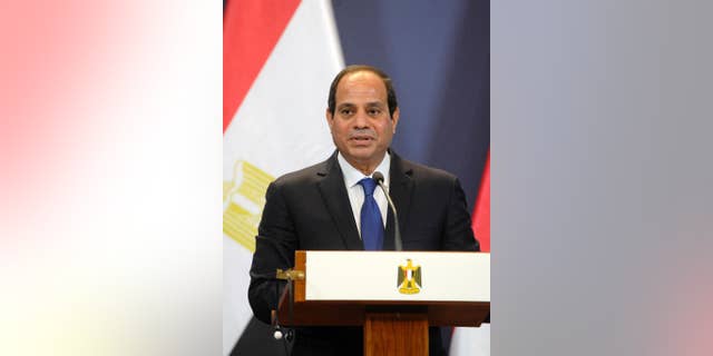 Egyptian President Abdel Fattah el-Sissi speaks during a joint press conference with Hungarian Prime Minister Viktor Orban in the Parliament building in Budapest, Hungary, Friday, June 5, 2015. El-Sissi is staying on a two-day visit in Hungary. (Zoltan Mathe/MTI via AP)