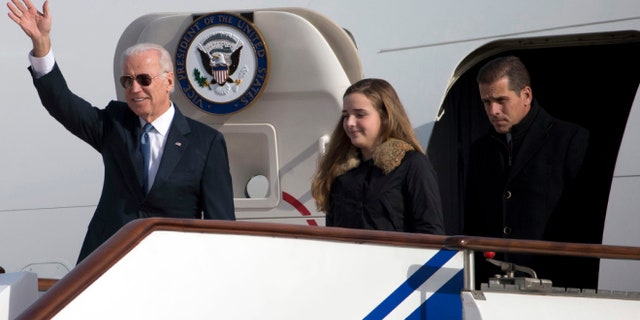 FILE: Dec. 4, 2013: from left, Vice President Joe Biden, granddaughter Finnegan Biden, son Hunter Biden, arriving in Beijing, China.