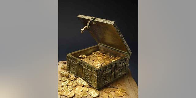 This undated photo provided by Forrest Fenn shows a chest purported to contain gold dust, hundreds of rare gold coins, gold nuggets, and other artifacts.