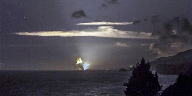 This Monday, Aug. 25, 2014, photo provided by Scott Wight shows the horizon from Cape Greville in Chiniak, Alaska, after authorities destroyed the weapon.