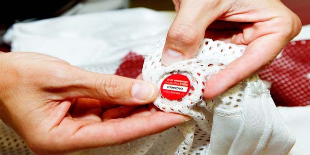 The small ICEDOT disc is made of durable plastic that clips on to any workout jersey, shorts or sweatshirt. And the company behind it claims it could save lives.