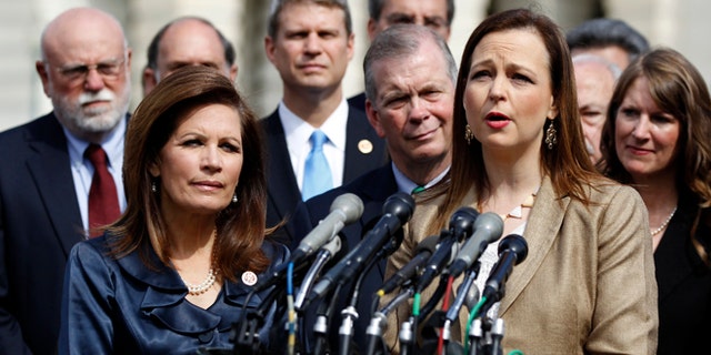 FILE â In this May 16, 2013, file photo Jenny Beth Martin, co-founder and national coordinator of the Tea Party Patriots, speaks during a news conference with Tea Party leaders, including Rep. Michele Bachmann, R-Minn., chair of the Tea Party Caucus, left, about the IRS' targeting Tea Party groups on Capitol Hill in Washington. "I think the IRS' integrity is shattered," said Martin. Tea Party Patriots, a fierce Obama critic, was among the largest nonprofit conservative groups targeted by the IRS; the group raised $20.2 million in 2011, up from $706,000 just two years earlier, according to tax filings. (AP Photo/Molly Riley, File)