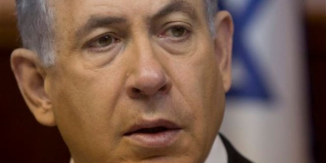 Israeli Prime Minister Benjamin Netanyahu attends the weekly cabinet meeting in his Jerusalem office, Sunday, Feb. 8, 2015. (AP Photo/Sebastian Scheiner, Pool)