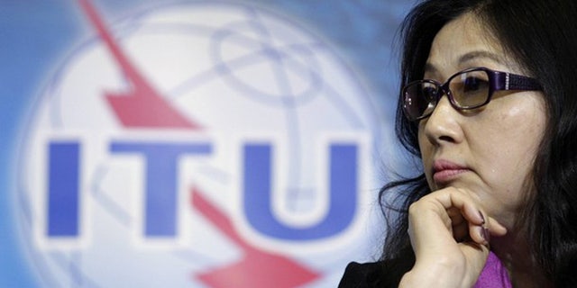 May 16, 2012: Sun Yafang, chairwoman of the board of Huawei Technologies listens to a speech before receiving a World Telecommunication and Information Society Award at the International Telecommunication Union (ITU) headquarters in Geneva.