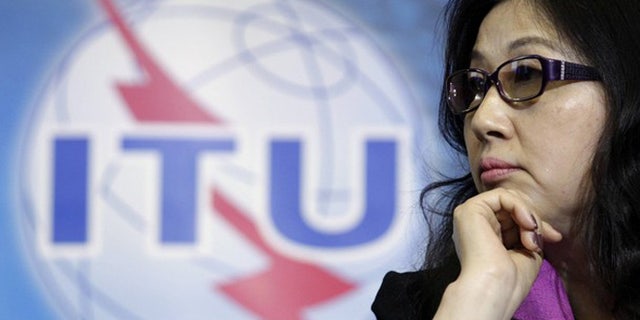 May 16, 2012: Sun Yafang, chairwoman of the board of Huawei Technologies listens to a speech before receiving a World Telecommunication and Information Society Award at the International Telecommunication Union (ITU) headquarters in Geneva.
