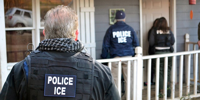 A file photo showing an ICE enforcement action in Atlanta one year ago, on Feb. 9, 2017.