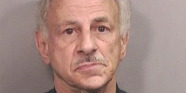 William Hotz, 59, is accused of punching a 55-year-old ice cream shop worker in the face after police say she refused to accept an expired coupon.