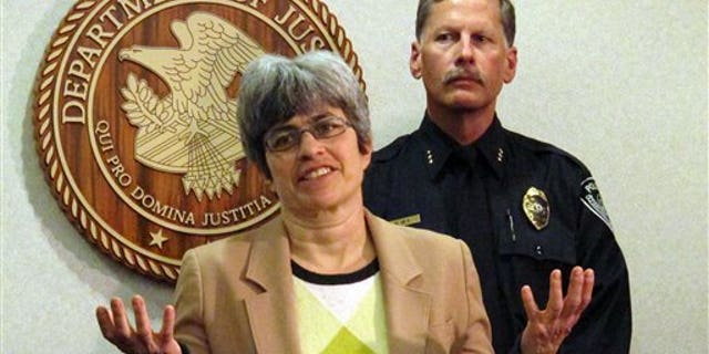 April 22: Karen Loeffler, left, the U.S. Attorney in Alaska and Police Chief Mark Mew address the media at a news conference in Anchorage, Alaska. Authorities say a Mexican national in the U.S. illegally stole another man's identity and became a police officer in Alaska. Mora Lopez had been employed as an Anchorage police officer since 2005 under the name Rafael Espinoza. (AP)