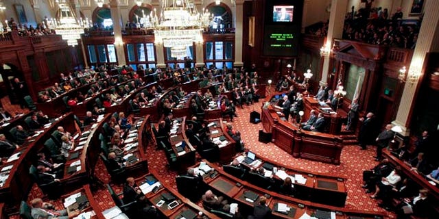 This Feb. 1, 2012 file photo shows the House Chambers of the Illinois State Capitol in Springfield, Illinois.
