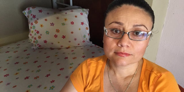 In this Thursday, July 30, 2015 photo, Rosa Robles Loreto sits in her small room at Southside Presbyterian Church in Tucson, Ariz., where she has taken sanctuary from deportation for a year. Robles Loreto, 42, says she is not leaving the church until the government assures her she will not be deported. (AP Photo/Astrid Galvan,File)