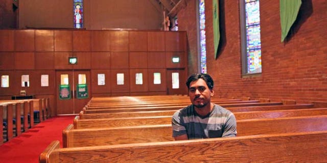 FILE - In this Sept. 24, 2014 file photo Francisco Aguirre Velasquez poses for a portrait at Augustana Lutheran Church in Portland, Ore. Aguirre, an immigrant who took refuge at the church to avoid deportation should be allowed to stay in the U.S. because of a judicial error at a hearing more than a decade ago, his attorney said Monday, July 6, 2015. (AP Photo/Gosia Wozniacka, File)