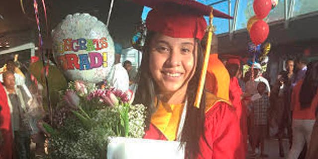 In this May 21, 2016 photo provided by Jessica Barcenas, Ivonne Barcenas Garcia poses in her cap and gown after her high school graduation held at the University of Georgia's Stegeman Coliseum in Athens, Ga. Growing up in Athens, Ivonne Barcenas, 18, had hopes of attending the University of Georgia. But a state law prohibits immigrants without permanent legal status from attending top public universities. Barcenas, whose family came from Mexico when she was 3, is among dozens of students awarded a private scholarship to attend Eastern Connecticut State University in the fall. The scholarship program helps immigrants from states with policies like Georgia's to attend and pay for college. (Jessica Barcenas via AP)