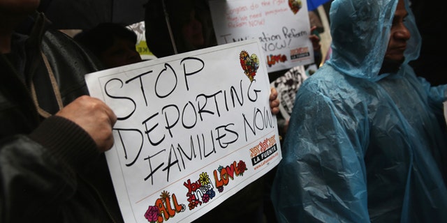 NEW YORK, NY - APRIL 07: Immigration reform advocates protest outside a fundraiser hosted by U.S. Speaker of the House John Boehner (R-OH), on April 7, 2014 in New York City. Boehner has blocked bi-partisan immigration reform legislation, passed by the Senate last year and supported by President Barack Obama, from reaching a vote in the House of Representatives. (Photo by John Moore/Getty Images)