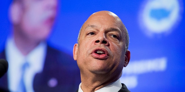 FILE - In this Jan. 24, 2014, file photo, Homeland Security Secretary Jeh Johnson speaks at the U.S. Conference of Mayors 82nd Winter Meeting in Washington. Johnson, who had little experience with immigration policy before he was appointed, has outlined for the first time his approach on the subject. He described an earned path to citizenship for the roughly 11 million immigrants living in the United States illegally as a matter of national security. (AP Photo/Manuel Balce Ceneta, File)
