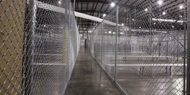 July 17, 2014: This photo shows a new intake facility built to help alleviate overcrowding at the U.S. Customs and Border Protection's McAllen Station in McAllen, Texas. (AP Photo/The McAllen Monitor, Joel Martinez)