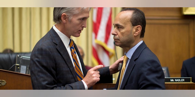 Rep. Trey Gowdy, R-S.C., left, talks with Rep. Luis Gutierrez, D-Ill., on Capitol Hill in Washington.