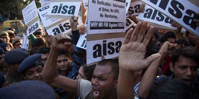 Dec. 7, 2014: Protestors from All India Students Association (AISA) demonstrate outside the Delhi Police headquarters after a taxi driver from the international cab-booking service Uber allegedly raped a young woman Friday in New Delhi, India. (AP)