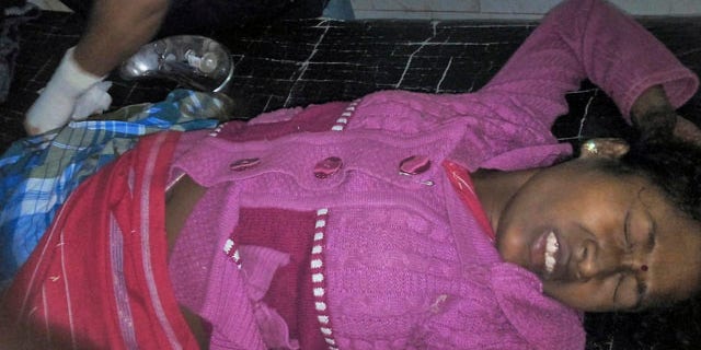 Dec. 23, 2014: An injured person is treated at a hospital in Kokrajhar district, in northeast state of Assam, India. (AP Photo/Press Trust of India)