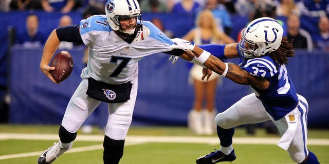 Jan 3, 2016; Indianapolis, IN, USA; Indianapolis Colts safety Dwight Lowery (33) pressures quarterback Tennessee Titans quarterback Zach Mettenberger (7) at Lucas Oil Stadium. Mandatory Credit: Thomas J. Russo-USA TODAY Sports