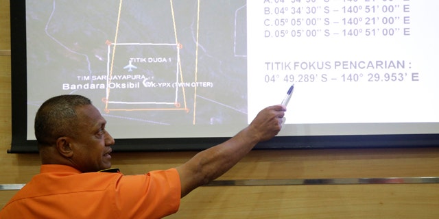 Aug. 17, 2015: National Search And Rescue Agency (BASARNAS) deputy operations director Heronimus Guru explains a search operation for the missing Trigana Air Service flight during a press conference in Jakarta, Indonesia. (AP Photo/Tatan Syuflana)