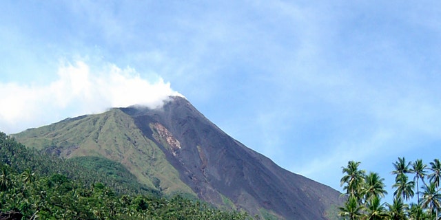 Debris from the Mount Karangetang volcano lies on the shoulder of the mountain in Siau, part of Indonesia's Sulawesi island chain, in this July 27, 2006 file photo.