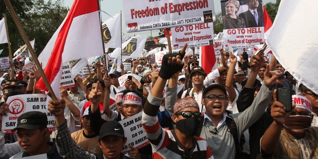 Sept. 30, 2012: Indonesian Muslims shout slogans during a protest against an anti-Islam film that has sparked anger among followers, outside the U.S. Embassy in Jakarta, Indonesia.