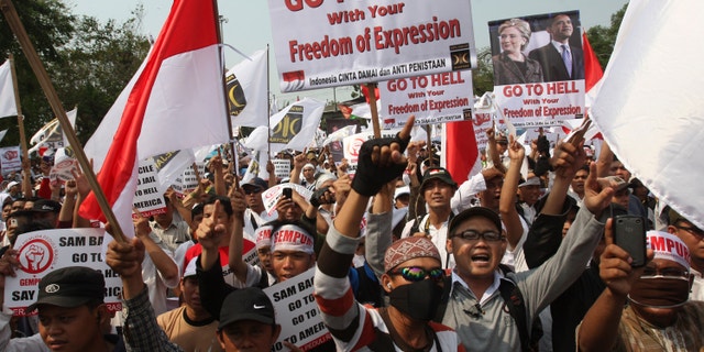 Sept. 30, 2012: Indonesian Muslims shout slogans during a protest against an anti-Islam film that has sparked anger among followers, outside the U.S. Embassy in Jakarta, Indonesia.
