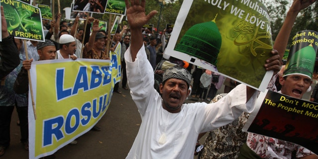 Sept. 21, 2012 : Indonesian Muslims shout slogans during a protest against an anti-Islam film that has sparked anger among followers, outside the U.S. Embassy in Jakarta, Indonesia.