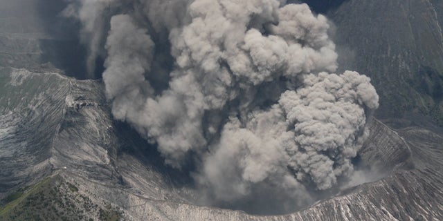 Mount Bromo spews volcanic materials as it erupts in this aerial shot taken from an Indonesian Air Force airplane that flies over Probolinggo, East Java, Indonesia on Monday, Nov. 29, 2010. The smoking volcano on Indonesia's main island has forced the closure of a local airport after it came back to life last week following a yearlong lull.