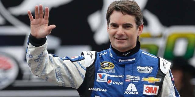 FILE - In this April 11, 2015, file photo, Sprint Cup Series driver Jeff Gordon waves during introductions before a NASCAR auto race at Texas Motor Speedway in Fort Worth, Texas. Jeff Gordon will drive the pace car for the Indianapolis 500 next month. He'll take the field to the green flag in the May 24 race, watch some laps with his wife and children, then fly to North Carolina to compete in NASCAR's Coca-Cola 600 that evening. Chevrolet made the announcement Wednesday, April 29, 2015, at Indianapolis Motor Speedway (AP Photo/Ralph Lauer, File)