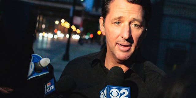 FILE - In this Oct. 28, 2013 file photo, television infomercial pitchman Kevin Trudeau speaks to the media after leaving the Metropolitan Correctional Center in downtown Chicago. On Monday, March 17, 2014, a federal judge in Chicago is scheduled to sentence Trudeau for bilking consumers through his infomercials. In November 2013, jurors convicted Trudeau for defying a court order barring him from running infomercials that made false claims about his book, "The Weight Loss Cure They Don't Want You to Know About." (AP Photo/Sun-Times Media, Michael Jarecki) MANDATORY CREDIT, MAGS OUT, NO SALES