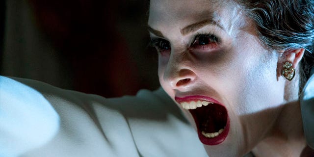 This film image released by FilmDistrict shows Danielle Bisutti in a scene from "Insidious: Chapter 2."