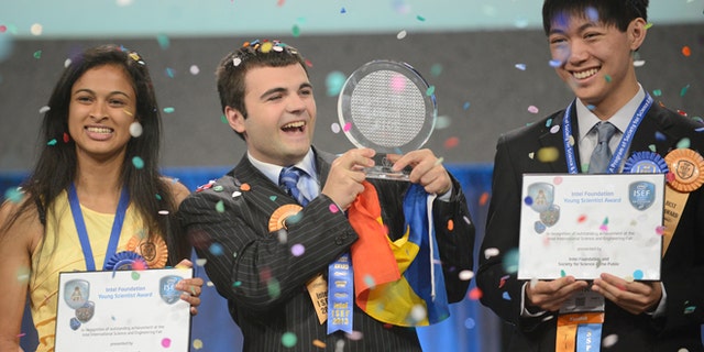 May 17, 2013: Top winner Ionut Budisteanu, 19, of Romania (center) with second-place winners Eesha Khare, 18, of Saratoga, Calif. (left) and Henry Lin, 17, of Shreveport, La. celebrate their awards at the Intel International Science and Engineering Fair, the world's largest high school science research competition. More than 1,600 high schoolers from 70 countries, regions and territories competed for more than $4 million in awards this week.