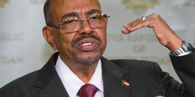 FILE - In this Jan. 6, 2014 Sudan's president Omar al-Bashir speaks after meeting with South Sudan's President Salva Kiir, in the capital Juba, South Sudan. Judges at the International Criminal Court on Monday March 9, 2015 have called on the U.N. Security Council to "take the necessary measures" to tackle Sudan's persistent refusal to arrest the country's president and send him to The Hague to stand trial on charges of orchestrating genocide in Darfur. It was the Security Council that called on the Hague-based court in 2005 to investigate widespread atrocities in Darfur — a move that led to President Omar al-Bashir being charged with genocide. (AP Photo/Ali Ngethi, File)
