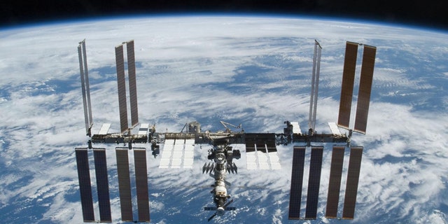 The International Space Station is photographed soon after the space shuttle Atlantis and the station began their post-undocking separation in 2009.